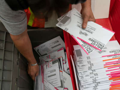 An election worker sorts submitted ballots at the Multnomah County Elections Office on November 2, 2020, in Portland, Oregon.