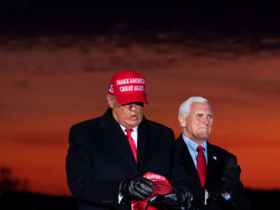 President Trump arrives with Vice President Pence for a rally at Cherry Capital Airport in Traverse City, Michigan, on November 2, 2020.