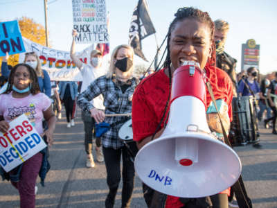 Detroit activists march through the city on November 7, 2020.