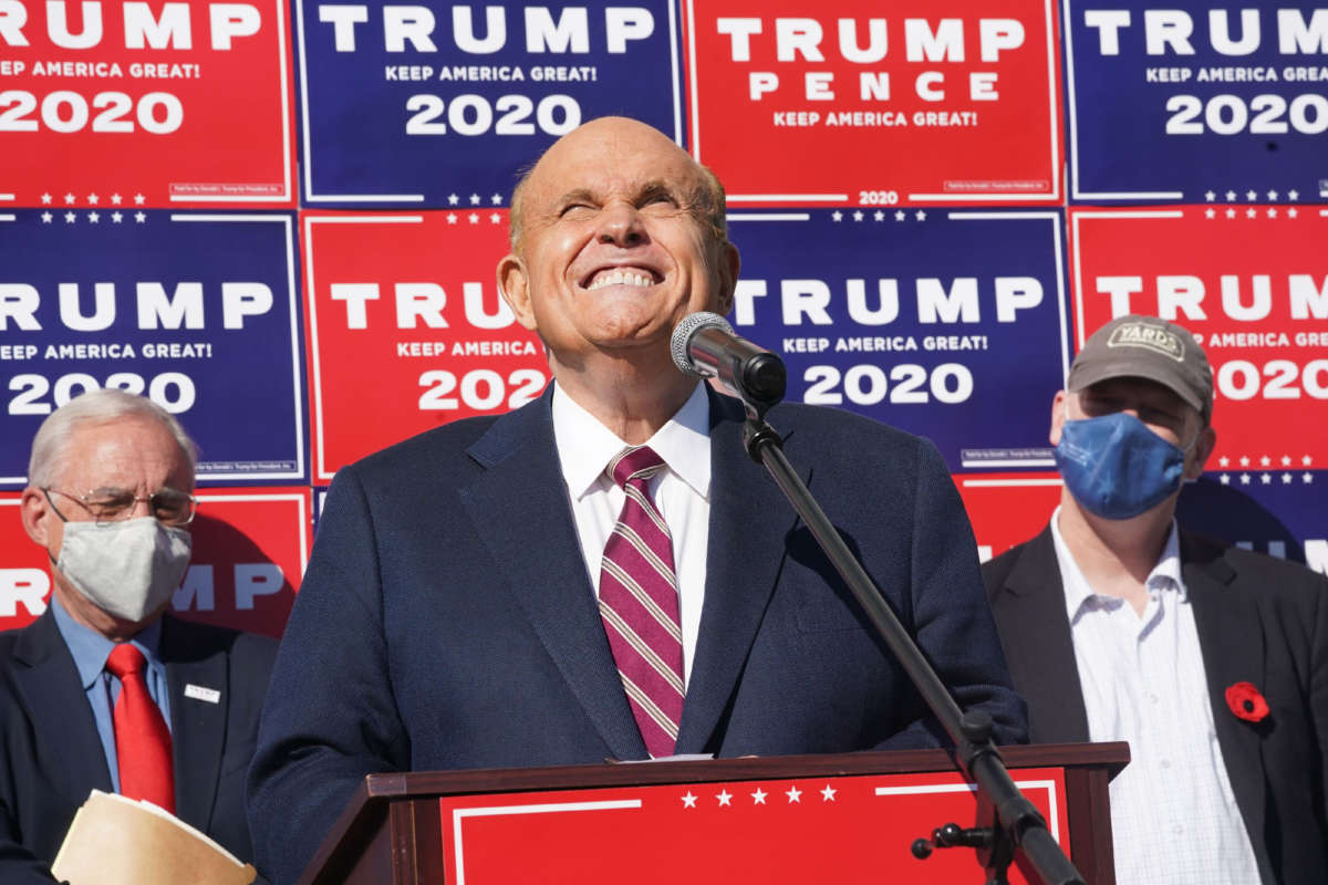 Attorney for the President, Rudy Giuliani, speaks at a news conference in the parking lot of a landscaping company on November 7, 2020, in Philadelphia.