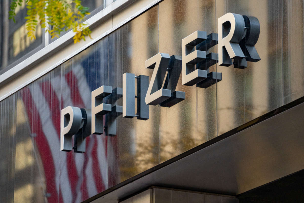 A sign for Pfizer is seen outside the Pfizer headquarters on November 9, 2020, in New York City.