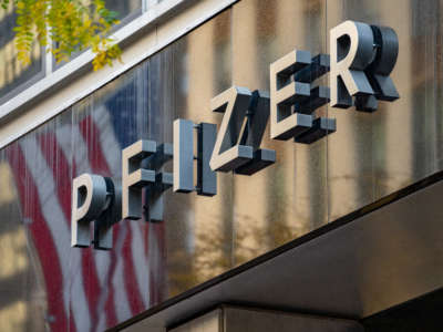 A sign for Pfizer is seen outside the Pfizer headquarters on November 9, 2020, in New York City.