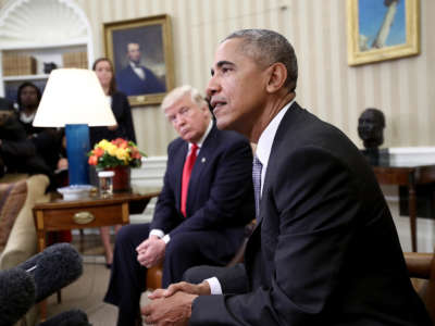 President-elect Trump listens as President Obama speaks during a meeting in the Oval Office, November 10, 2016, in Washington, D.C.