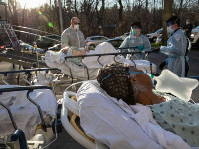 COVID-19 patients arrive to the Wakefield Campus of the Montefiore Medical Center on April 6, 2020, in the Bronx borough of New York City.