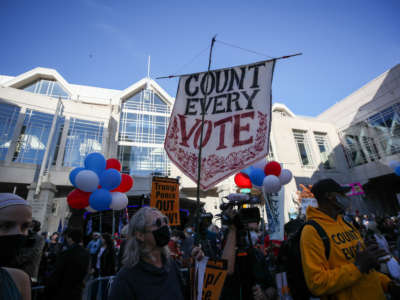 Trump and Biden supporters gather at the ballot counting center in Philadelphia, Pennsylvania, on November 6, 2020.