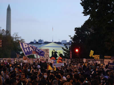 A huge crowd gathers outside the white house to celebrate donald trump's loss