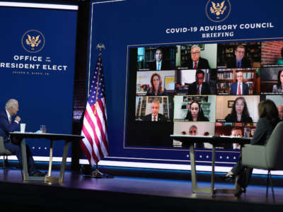 President-elect Joe Biden and Vice President-elect Kamala Harris receive a briefing from the transition COVID-19 advisory board on November 9, 2020, in Wilmington, Delaware.