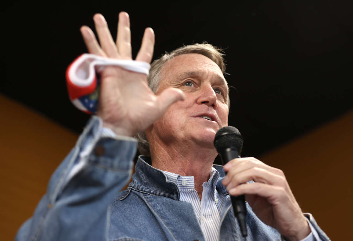 Sen. David Perdue speaks during a campaign event at Pot Luck Cafe on October 31, 2020, in Monroe, Georgia.