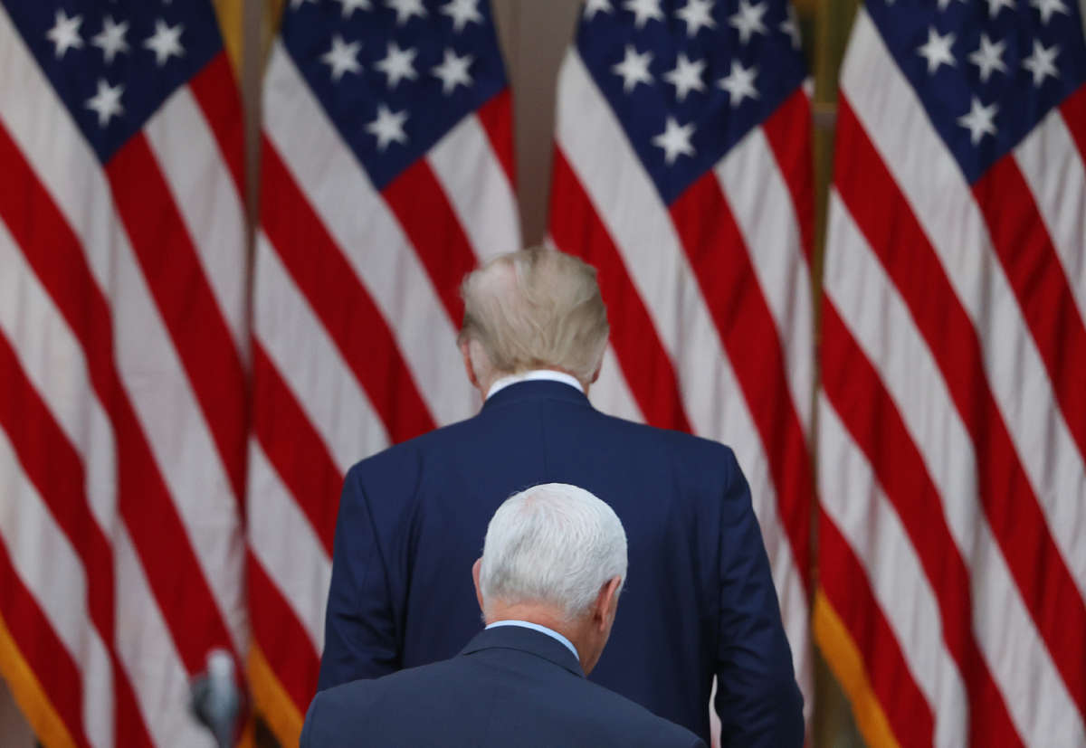 President Trump and Vice President Pence walk away after speaking in the Rose Garden at the White House on November 13, 2020, in Washington, D.C.