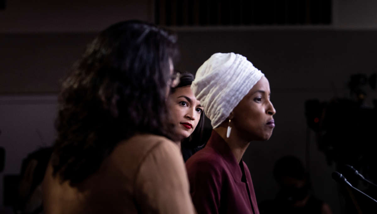 Rep. Ilhan Omar speaks as Reps. Alexandria Ocasio-Cortez and Rashida Tlaib look on during a press conference at the U.S. Capitol in Washington, D.C., on July 15, 2019.