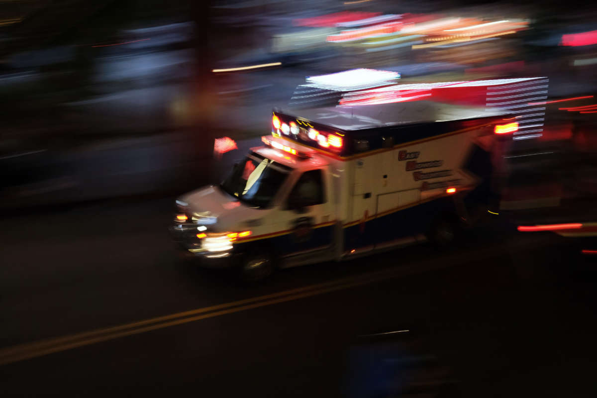 An ambulance drives through Borough Park on September 28, 2020, in New York City.