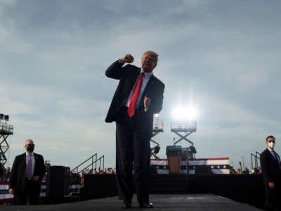 President Trump dances while leaving after speaking at a rally at Ocala International Airport in Ocala, Florida, on October 16, 2020.