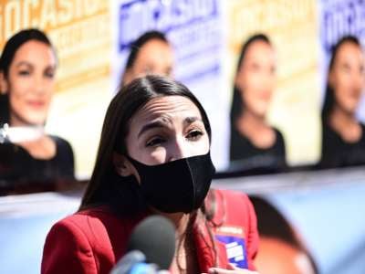 Rep. Alexandria Ocasio-Cortez speaks to the press near a polling station during the New York primaries Election Day on June 23, 2020, in New York City.