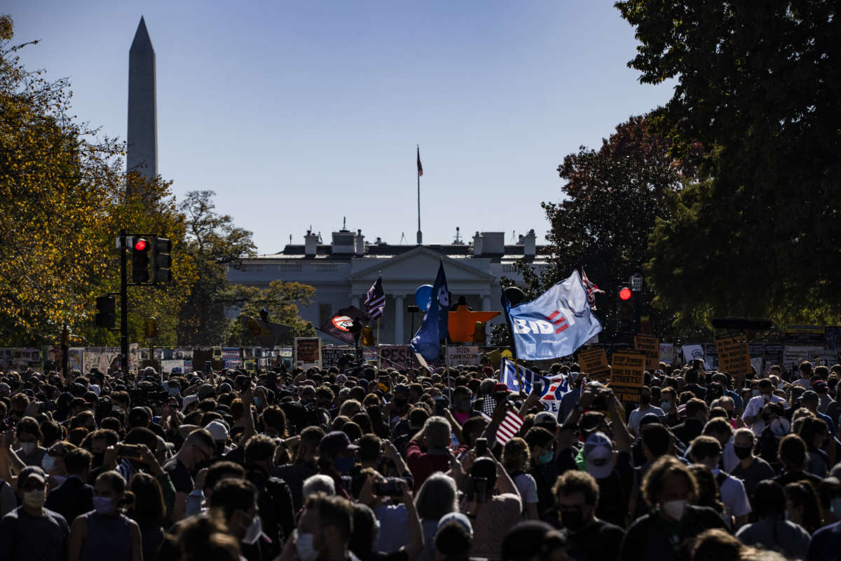 People gather at Black Lives Matter Plaza to celebrate former Vice President Joe Biden's victory over President Donald Trump in the 2020 Presidential Election near the White House on November 7, 2020, in Washington, D.C.