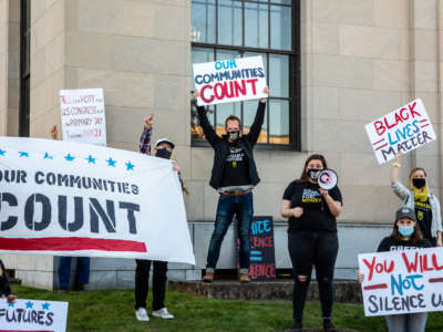 People gathered near the Post Office in Lewisburg, Pennsylvania, to celebrate the election of Joe Biden as president of the United States on November 7, 2020.