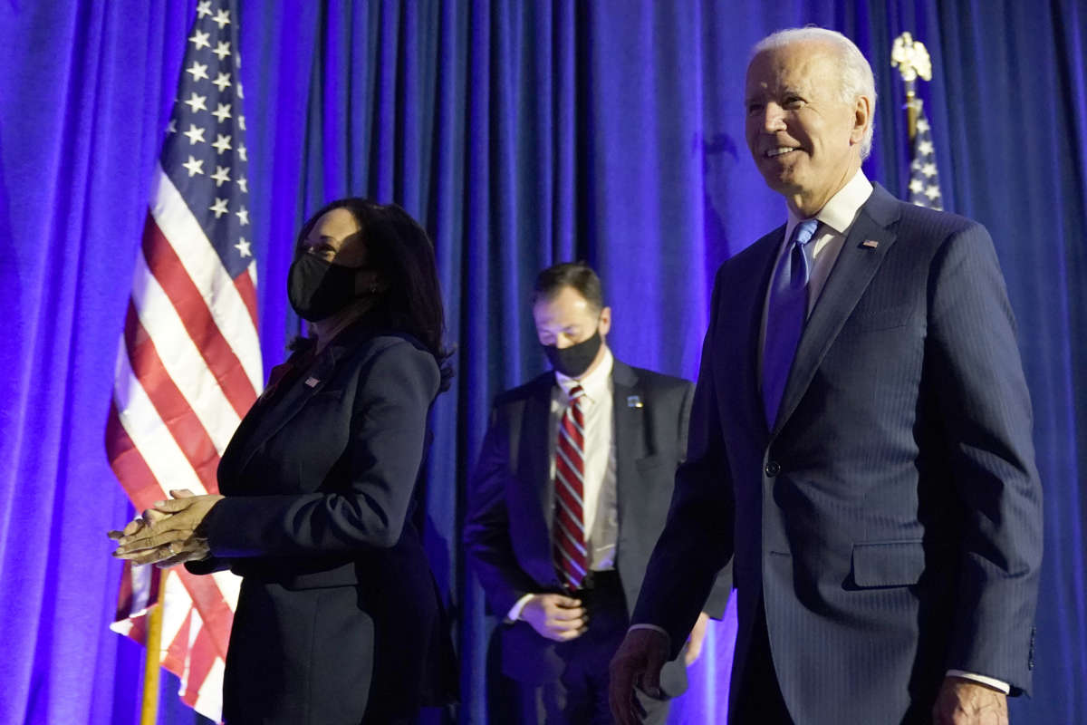 Democratic presidential nominee Joe Biden and vice presidential nominee Sen. Kamala Harris leave the stage after addressing the nation at the Chase Center November 6, 2020, in Wilmington, Delaware.