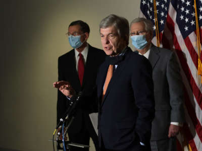 Senate Majority Leader Sen. Mitch McConnell listens as Sen. Roy Blunt speaks during a news conference after the weekly Senate Republican policy luncheon at the Hart Senate Office Building November 17, 2020, on Capitol Hill in Washington, D.C.