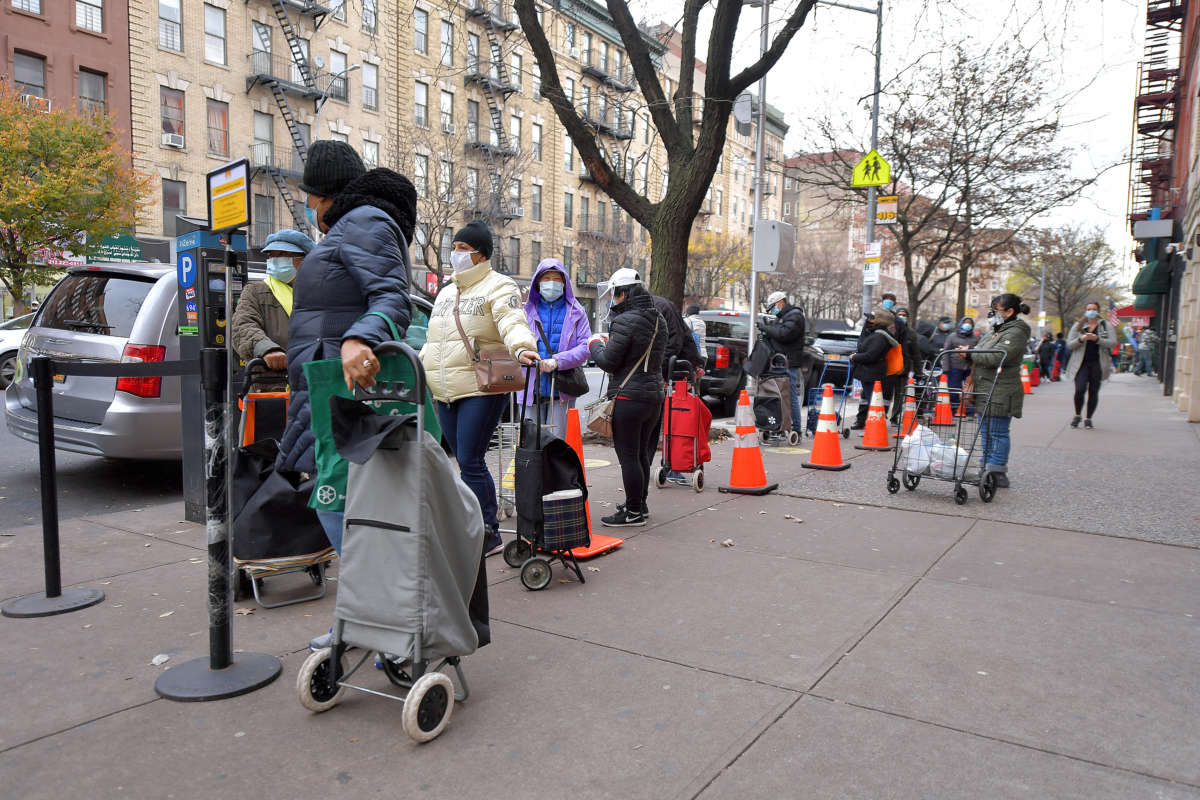 A view of the line as Food Bank For New York City distributes Thanksgiving meals to go at Community Kitchen & Food Pantry on November 25, 2020, in New York City.