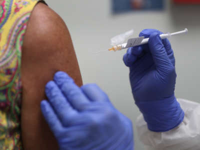 A patient recieves a vaccine