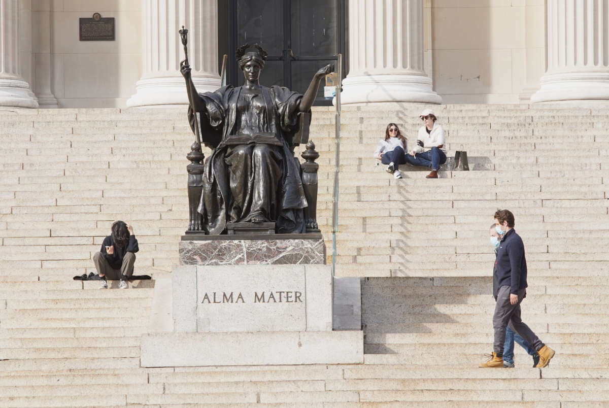 People are seen on the campus of Columbia University during the coronavirus pandemic on April 14, 2020, in New York City.