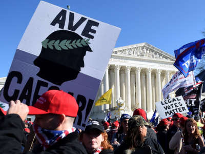 Supporters of President Trump rally at the Supreme Court in Washington, D.C., on November 14, 2020.