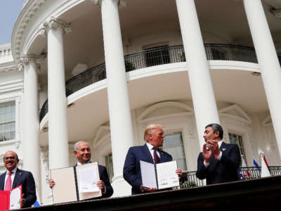 From left: Foreign Affairs Minister of Bahrain Abdullatif bin Rashid Al Zayani, Prime Minister of Israel Benjamin Netanyahu, President Trump, and Foreign Affairs Minister of the United Arab Emirates Abdullah bin Zayed bin Sultan Al Nahyan participate in the signing ceremony of the Abraham Accords on the South Lawn of the White House on September 15, 2020, in Washington, D.C.