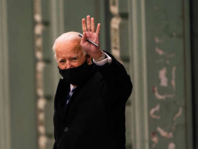 President- elect Joe Biden exits the Queen in Wilmington, Delaware, on December 9, 2020.