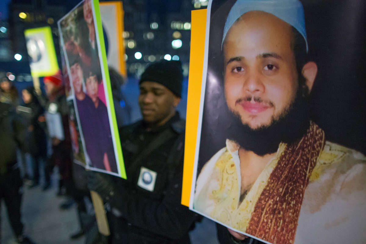 A small group of family and friends of Soleiman Faqiri hold a vigil at Nathan Phillips Square in Toronto on February 8, 2017.