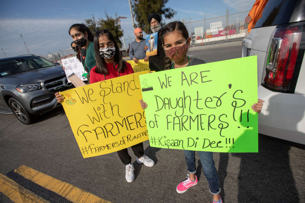 Two young protesters attend a demonstration in solidarity with Indian farmers on December 5, 2020, in California.