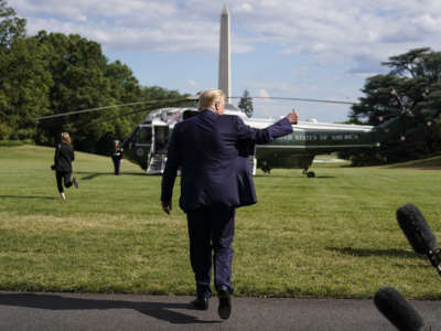 President Donald Trump give a thumbs up after speaking to the media as he departs for Walter Reed National Military Medical Center from the White House on July 11, 2020, in Washington, D.C.