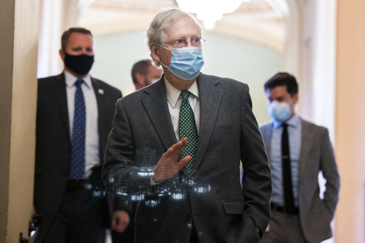 Senate Majority Leader Mitch McConnell leaves the Senate floor in the Capitol on Thursday, December 3, 2020.