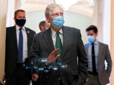 Senate Majority Leader Mitch McConnell leaves the Senate floor in the Capitol on Thursday, December 3, 2020.