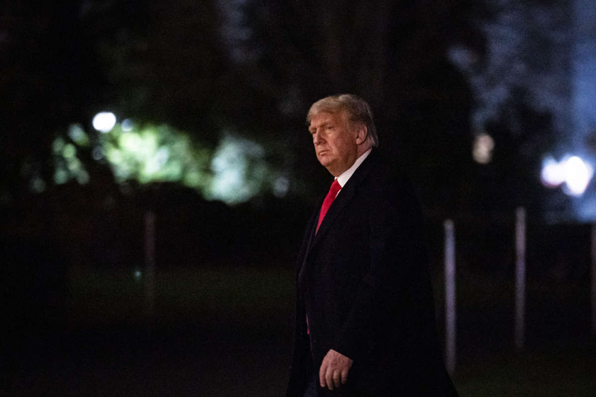 Donald Trump arrives on the South Lawn of the White House, on December 12, 2020, in Washington, D.C.