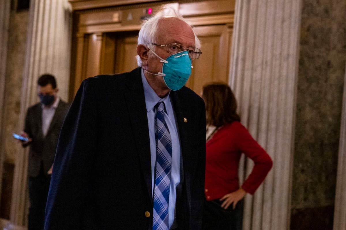 Sen. Bernie Sanders heads to the Senate floor at the Capitol building on December 20, 2020, in Washington, D.C.