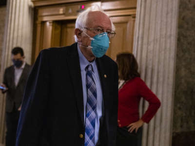 Sen. Bernie Sanders heads to the Senate floor at the Capitol building on December 20, 2020, in Washington, D.C.
