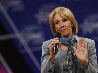 Education Secretary Betsy DeVos speaks to the crowd gathered during the Conservative Political Action Conference annual meeting on February 27, 2020.