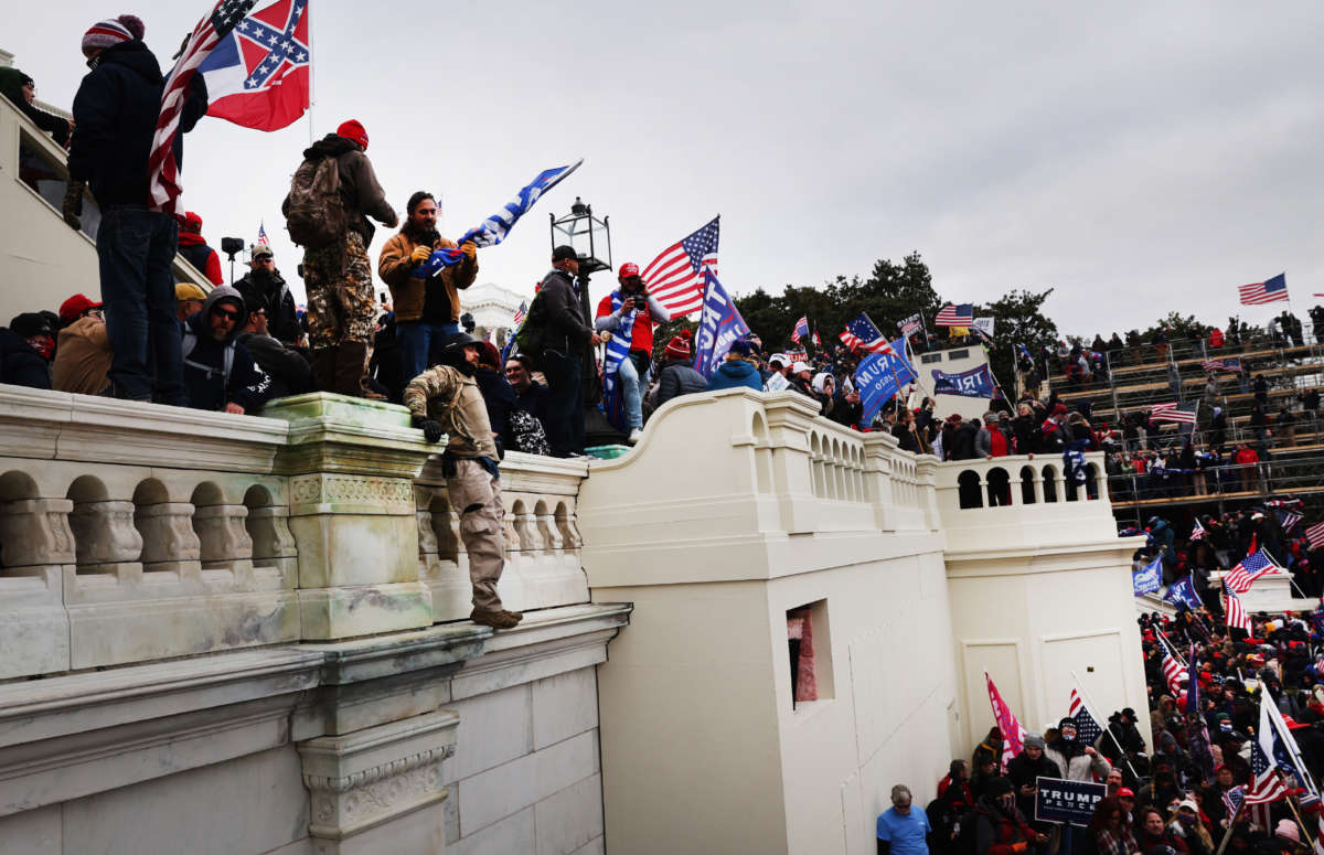 Trump loyalists storm the U.S. Capitol building following a rally on January 6, 2021, in Washington, D.C.