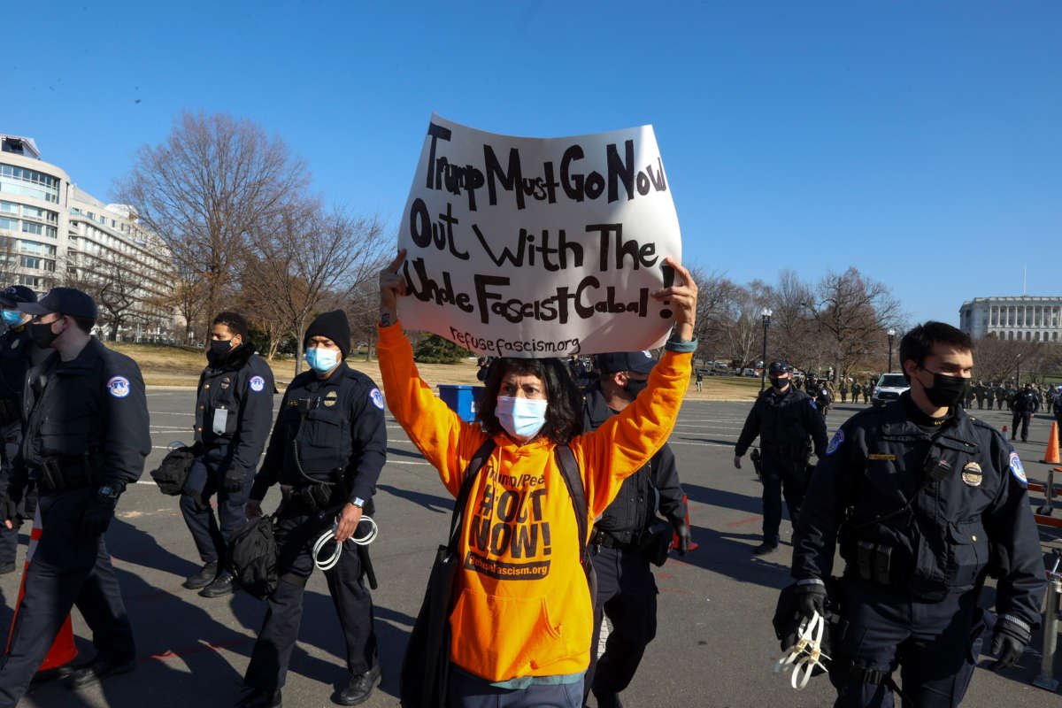 U.S. Capitol Police prepare to make arrests as anti-Trump protesters gather on the West Front of the U.S. Capitol on January 13, 2021, in Washington, D.C.