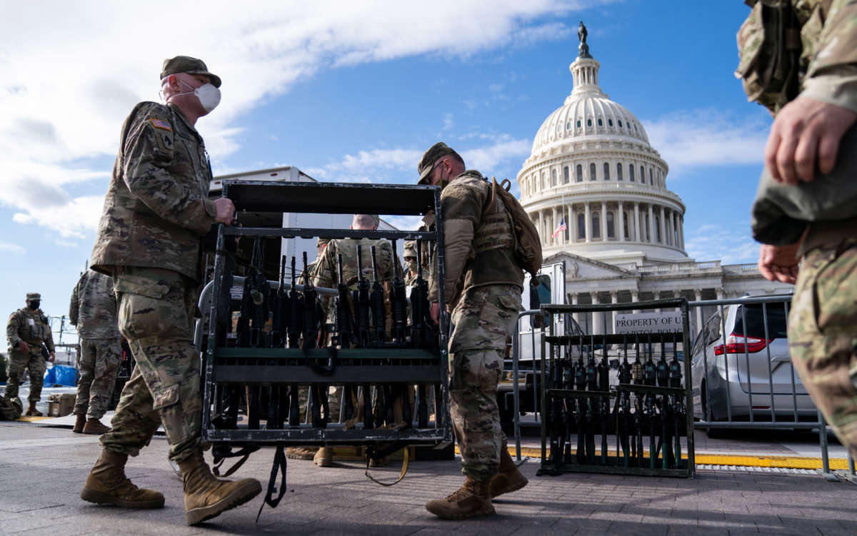 National Guard members unload weapons and supplies outside of the U.S. Capitol building on January 17, 2021, in Washington, D.C.