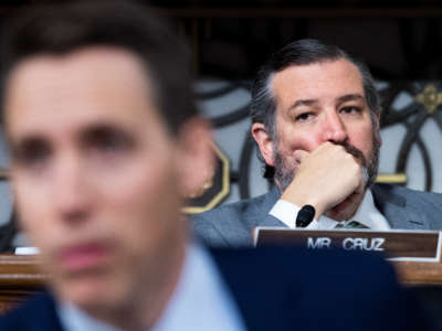 Sens. Ted Cruz, right, and Josh Hawley attend the Senate Judiciary Committee markup on judicial nominations and the Online Content Policy Modernization Act, in Dirksen Building on December 10, 2020.