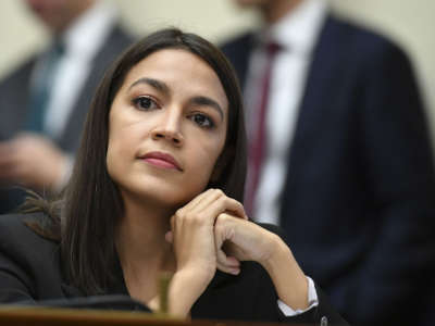 Rep. Alexandria Ocasio-Cortez listens during a committee hearing in the Rayburn House Office Building in Washington, D.C., on October 23, 2019.
