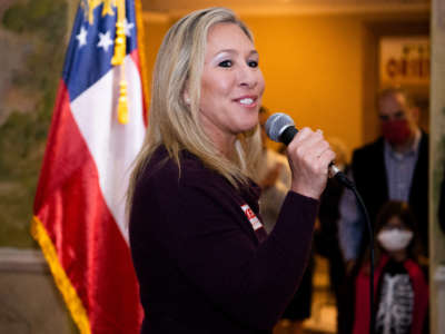 Marjorie Taylor Greene speaks during a campaign event for Sen. Kelly Loeffler at the Floyd County Republican Party Headquarters in Rome, Georgia, on October 31, 2020.