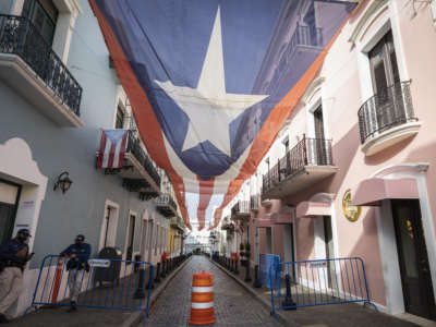 The Puerto Rican flag is seen outside the Governor's residence as Puerto Ricans vote in the general election in San Juan, Puerto Rico, on November 3, 2020.