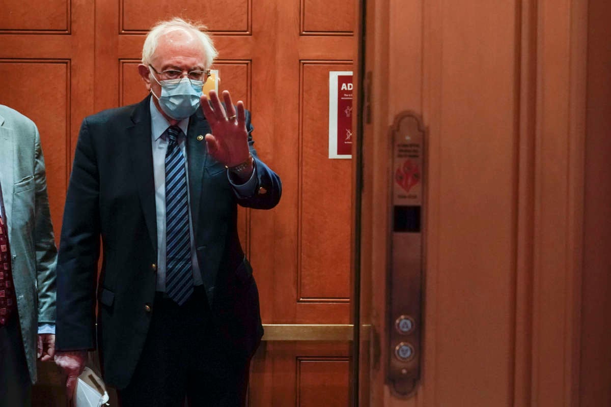 Sen. Bernie Sanders walks from speaking as the Senate resumes debate on overriding the veto of the National Defense Authorization Act (NDAA) on Capitol Hill on December 31, 2020, in Washington, D.C.