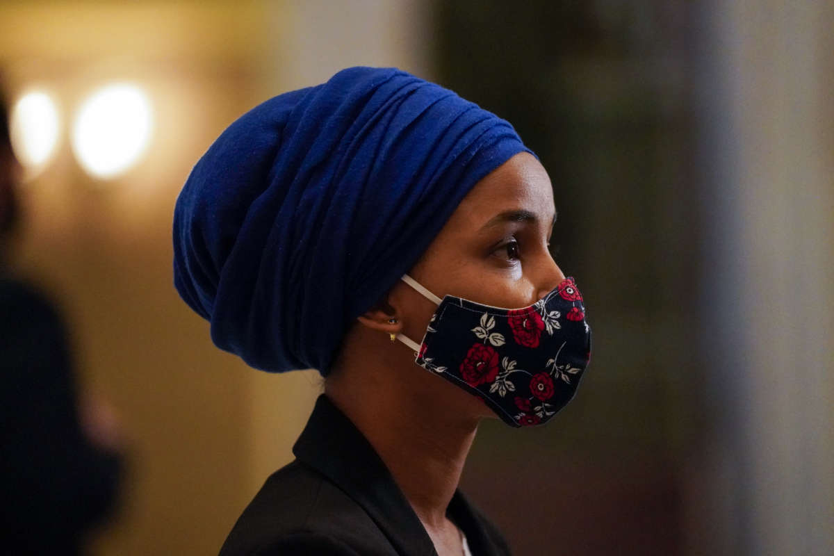 Rep. Ilhan Omar speaks to reporters in Statuary Hall on Capitol Hill on January 12, 2021 in Washington, D.C.. )