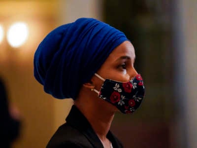 Rep. Ilhan Omar speaks to reporters in Statuary Hall on Capitol Hill on January 12, 2021 in Washington, D.C.. )