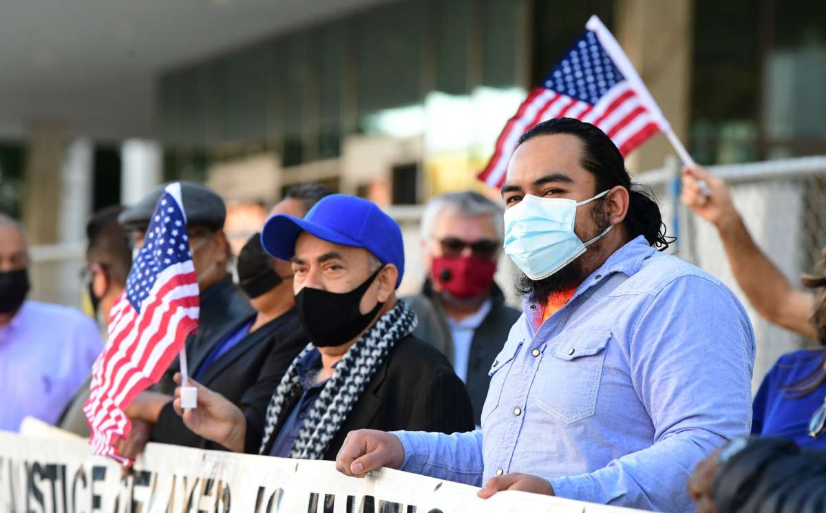 Immigrant rights groups call on the incoming Biden/Harris administration to establish a cut-off date for new comprehensive immigration reform and reverse the xenophobic climate created in the last four years during a rally outside the Federal Building in Los Angeles, California, on January 14, 2021.