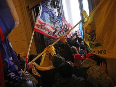 Protesters supporting then-President Donald Trump break into the U.S. Capitol on January 6, 2021, in Washington, D.C.