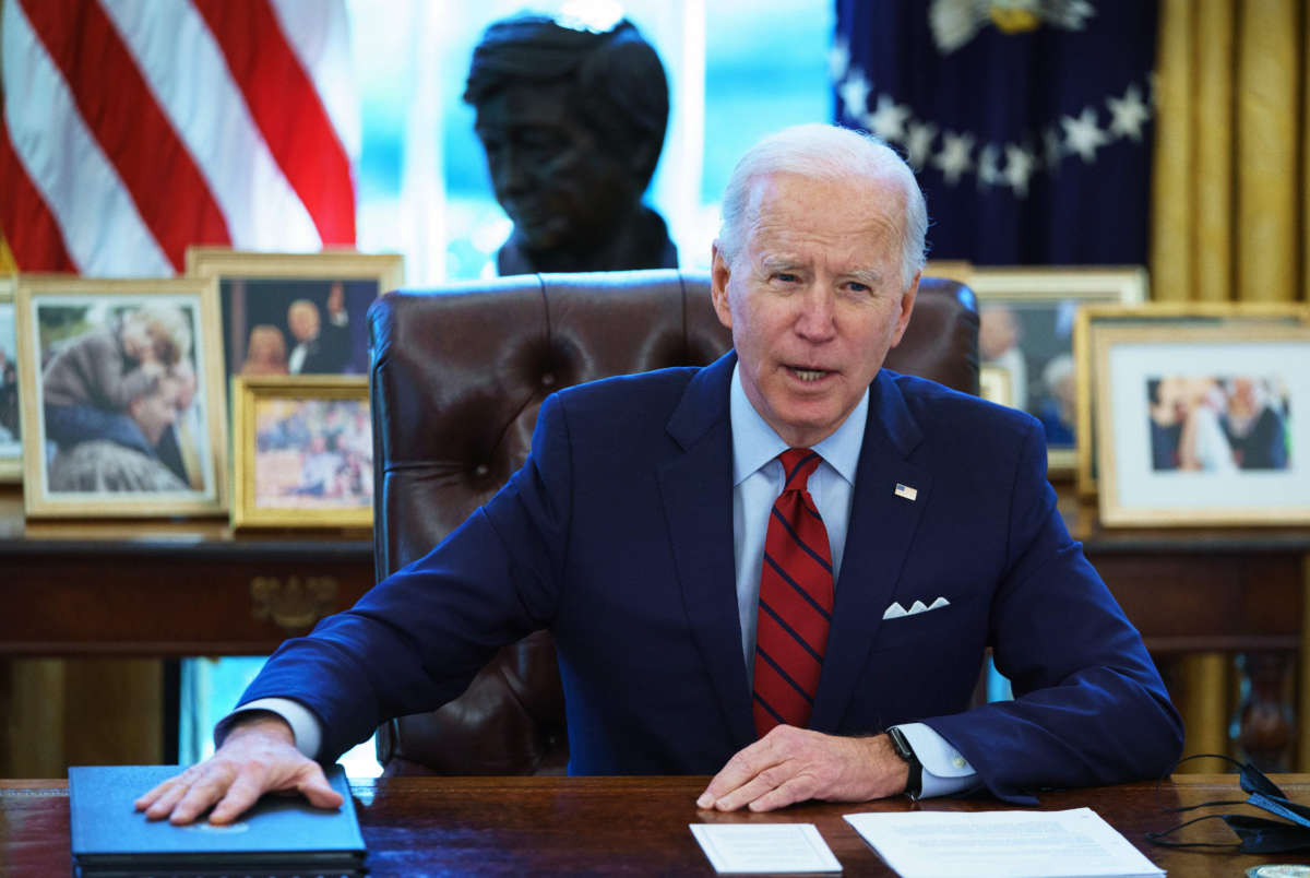 President Joe Biden speaks before signing executive orders on health care in the Oval Office of the White House in Washington, D.C., on January 28, 2021.