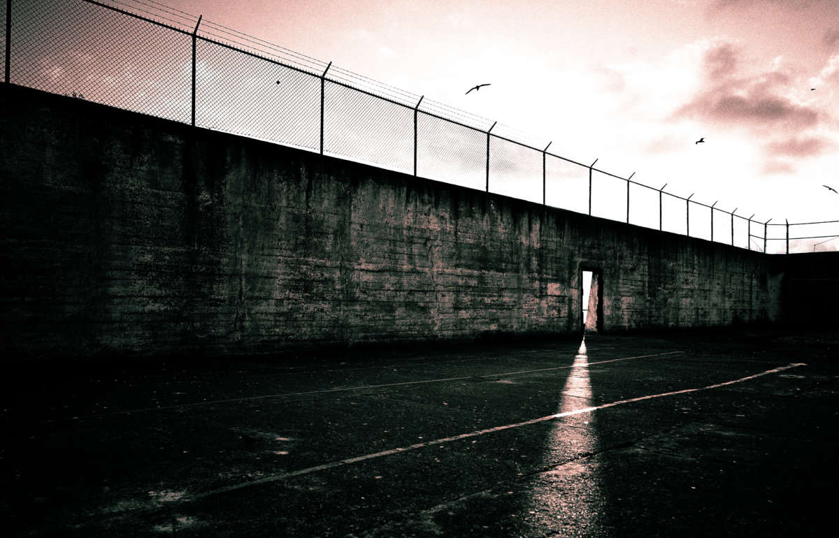 Prison courtyard with open door